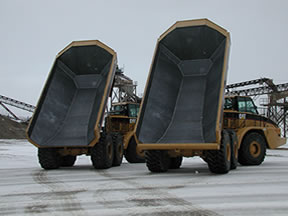 Футерованные QuickSilver самосвалы Caterpillar